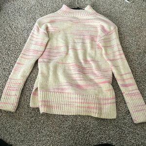 White sweater with some pink stripes